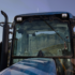 Model 795 LED Work Light on Front of Blue Tractor
